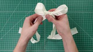 How to Tie a Perfect Bow in Ribbon [upl. by Queenie713]