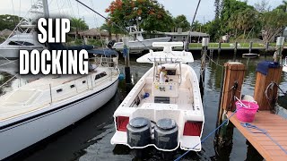 LEARN TO BACK A BOAT INTO A SLIP  How to Dock  Gale Force Twins [upl. by Nehtiek567]