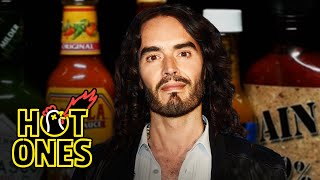 Russell Brand Serenades Superfan Brett Baker While Eating Spicy Wings  Hot Ones [upl. by Esilahc]