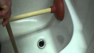 How to Unplug or clear a bathtub drain Easily [upl. by Aksehcnarf]