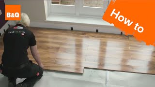 How to lay flooring part 3 laying locking laminate [upl. by Cassella]