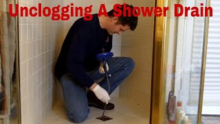 Unclogging A Shower Drain [upl. by Siryt]