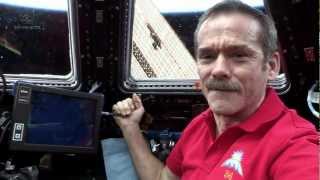 Hadfield behind the controls of Canadarm2 [upl. by Aicilyt]