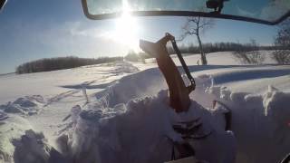 Hardcore snow blowing 6 foot deep snow drifts with the massey ferguson 4609 [upl. by Ainavi]