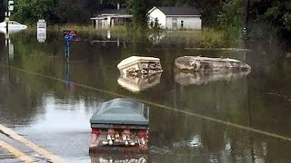 Eerie Coffins Seen Floating Through Flooded Louisiana Streets [upl. by Artiek]