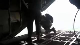 Jumpmaster Gets Sucked Out of a Plane When His Parachute Deploys Early [upl. by Airottiv971]