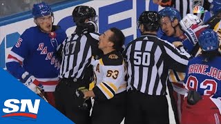 Brad Marchand Receives Helmet Popping Cross Check From Pavel Buchnevich [upl. by Franek]